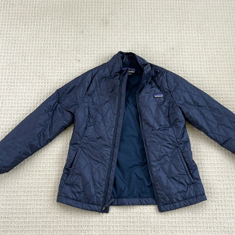Like new, very gently used Kids Sz XL navy blue zip down Patagonia jacket